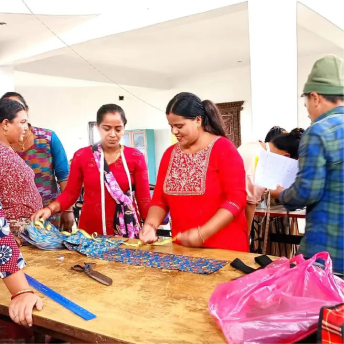 photo of women measuring materials